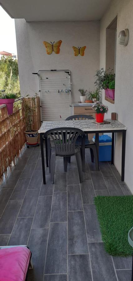 Les Romarins Appartement Climatise ลาแซน-ซูร์-แมร์ ภายนอก รูปภาพ